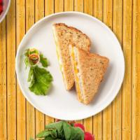 Muenster Inc. Cheese Sandwich · Munster cheese on a bread.