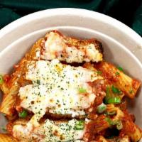 Chicken Parmesan · Penne pasta, homemade marinara, crispy vegan chicken, vegan mozzarella cheese