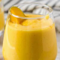 Vegan Mango Lassi · Alphonso mango puree, greek yogurt smoothie