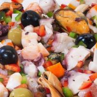 Salpicón De Mariscos / Seafood Salad With Peppers · Pulpo, calamares, camarones y vinagreta. / Octopus, squid, shrimp and vinaigrette.
