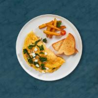 Greek Omelette · Scrambled eggs, olive, feta cheese and tomato.