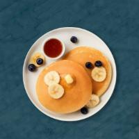 Wild Pancakes · 3 pcs fluffy pancakes cooked with care and love served with blueberry, strawberry and banana...
