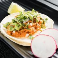 Grilled Chicken Taco · Served with cilantro, onions, radish and lime.