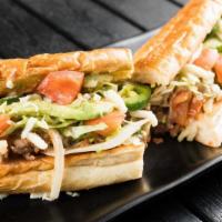 Alambre Tepito Grilled Sandwich · Served in a 6-inch white baguette with Mozzarella cheese, chipotle mayo and a slice of avoca...