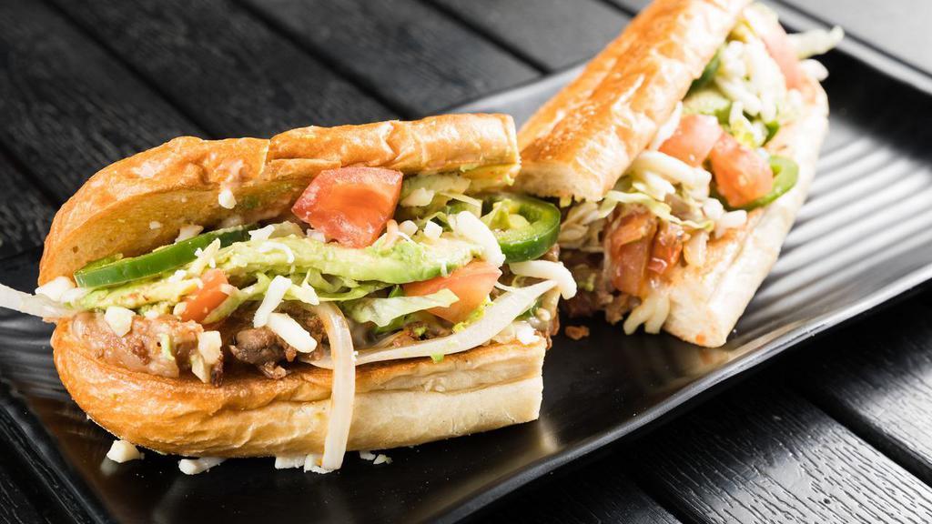 A La Mexicana Grilled Sandwich · Beef, sautéed jalapeños, onions and tomatoes. Served in a 6-inch white baguette with Mozzarella cheese, chipotle mayo and a slice of avocado.