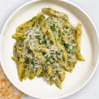 The Besto Pesto Pasta (Penne) · Fresh basil leaves, garlic, grated parmesan cooked with penne. Served with side of garlic br...