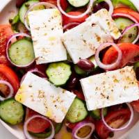 Greek Salad · Mixed greens with cucumbers, olives, cherry tomatoes, feta cheese, and Greek dressing. Serve...