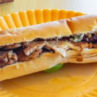 Pan Con Lechon · Slow roasted pork served with raw onions.