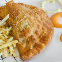 Empanadas · Fried pastry stuffed with chicken, beef, or ham and cheese.
