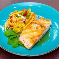 Salmon Mango · Grilled fillet salmon topped with green mango salad dressing.