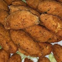 Bolos De Bacalhau  · fried cod fish cakes 12ct