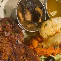 Mar & Terra · surf and turf 
filet mignon with lobster tail and mushroom sauce served with French fries an...