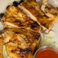 Frango No Churrasco · charcoal grill chicken 
half chicken