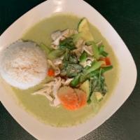 Green Curry · Spicy. With coconut milk, bamboo shoots, bell pepper and fresh basil. Served with jasmine ri...