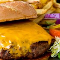 Cheese Burger · Our classic hamburger smothered with creamy American cheese and topped with lettuce and toma...