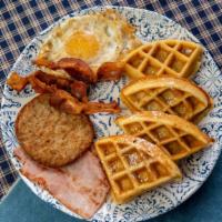Deluxe Waffle · Served with one egg, bacon, ham, and sausage.