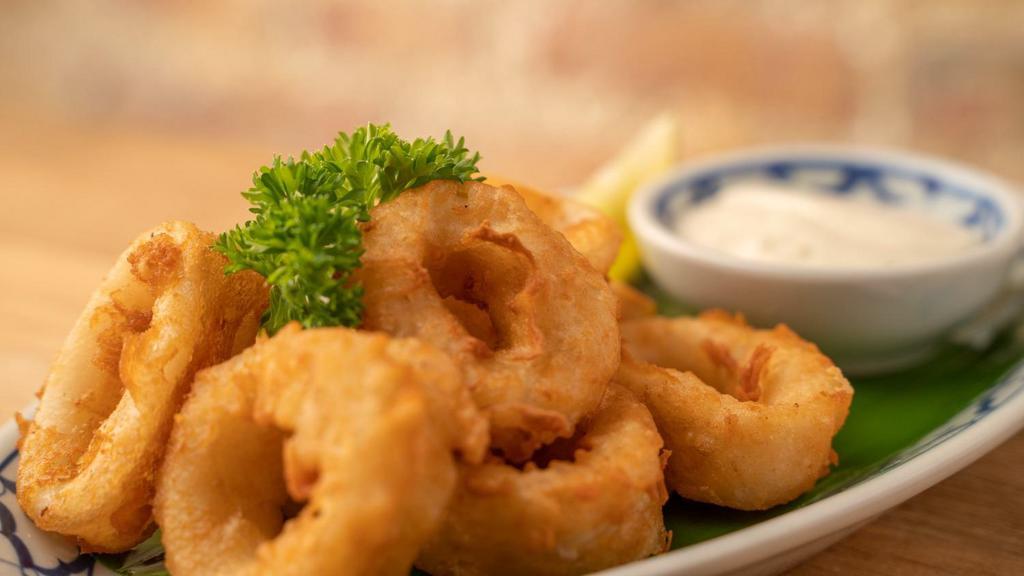 Golden Calamari · Calamari tempura and seafood mayonnaise sauce.