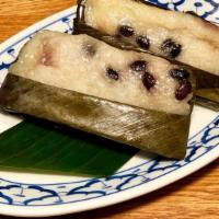 Kao Tom Mud · Banana and steamed sticky rice wrapped in banana leaves.