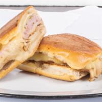 Cubano · With black forest ham, fresh pork loin, pickles, mustard and gruyere.