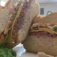 Carmine'S American Combo · Roast beef, turkey, ham, American cheese, lettuce, tomato and mayonnaise. All cold cuts are ...