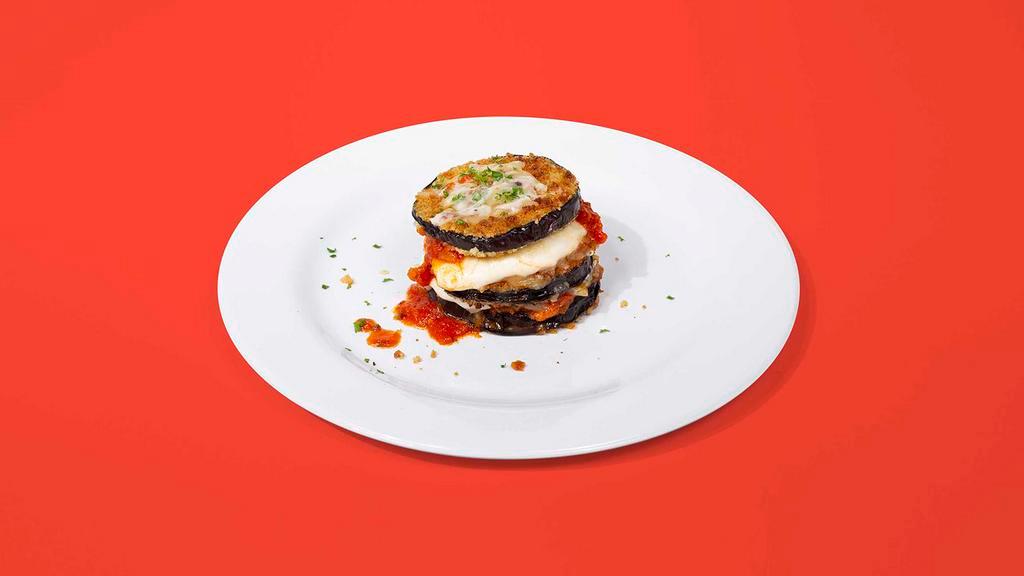 Eggplant Parmesan · Breaded eggplant topped with marinara sauce and melted mozzarella cheese. Served with your choice of pasta, potatoes or veggies on the side.