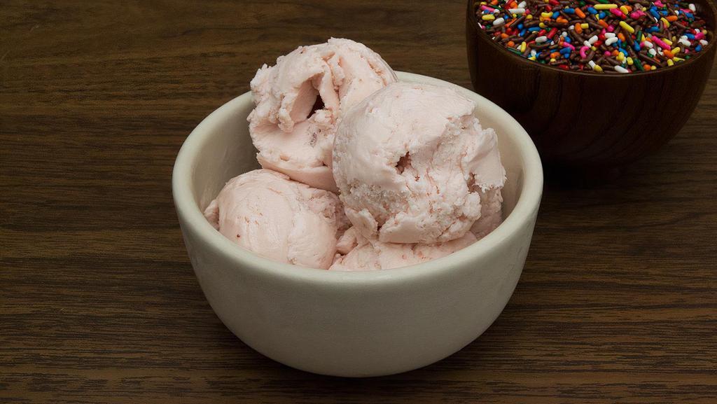 Strawberry Ice Cream · Comes with a 9oz cup of strawberry ice cream. Additional Toppings Sold separately.