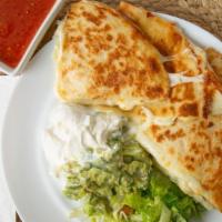 Cheese Quesadilla · Flour tortillas with cheese. Served with choice of french fries or rice and refried beans.
