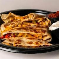 Grilled Chicken Quesadilla · Grilled chicken, onions, peppers & cheddar cheese served with a side of salsa and sour cream