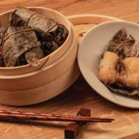 Sticky Rice Wrapped In Bamboo Leaves / 素糯米雞 · Served with two pieces. / 附兩個。