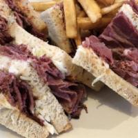 Corned Beef & Pastrami Club · Cole slaw and Russian dressing.