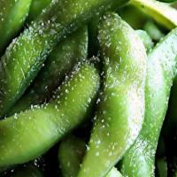 Edamame · Warm salted soybeans in the pod, available plain steamed or spicy garlic wok sautéed!