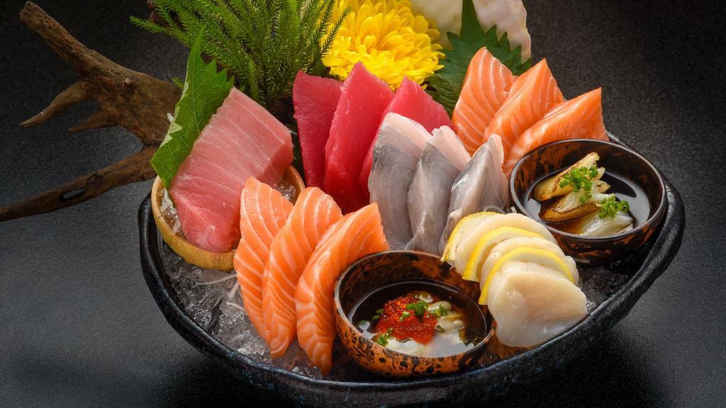 Sashimi 2Pc (Raw Fish Slices) · Photo example of sashimi - raw fish slices.  2pc per order.