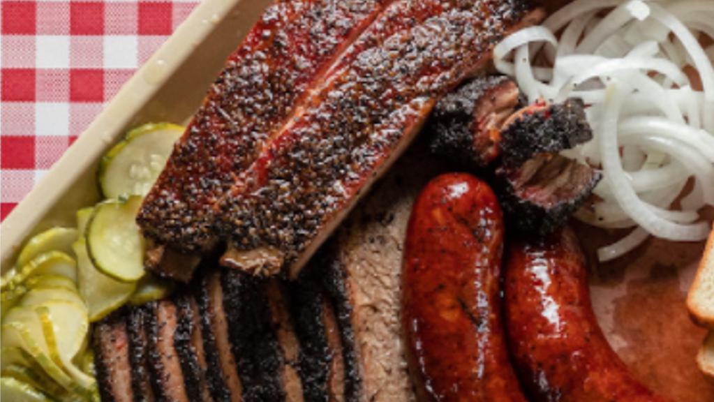Smokehouse Bbq 2Lb Combo Board For Two · Our artisan hickory and mesquite smoked BBQ is available daily, until it runs out for the day.  A sample two pound platter of every delicious smoked meat available (meat only). Note: red smoke ring may exist, the meat is fully cooked.