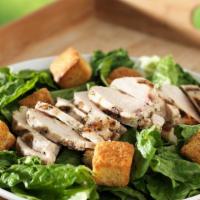 Grilled Chicken Caesar Salad · Fresh green salad prepared with Grilled chicken, cheese, romaine lettuce, carrots, grape tom...
