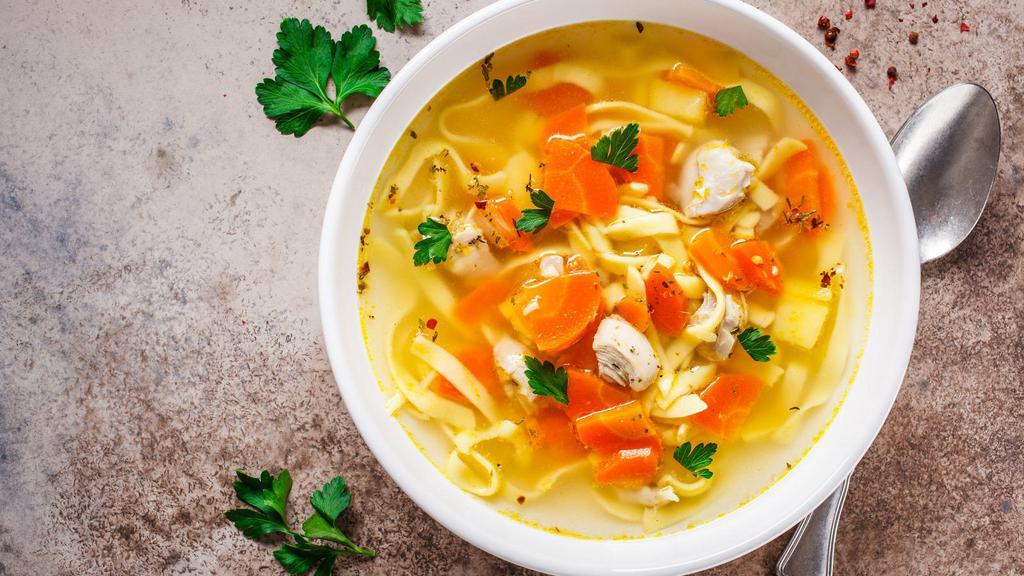 Chicken Noodle Soup · Hot & Tasty soup made with pieces of chicken, broth, noodles, and vegetables.
