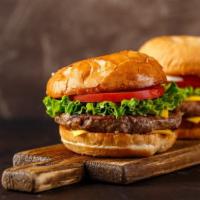 Cheeseburger · Delicious Cheeseburger grilled to perfection and topped with lettuce, tomato, and pickles. S...
