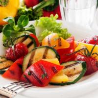 Grilled Veggies · A side dish consisting of Zucchini, eggplant, and broccoli perfectly seasoned and grilled to...