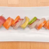 Rainbow Roll · Kani, avocado, cucumber, masago, topped with tuna, salmon, white fish, avocado.