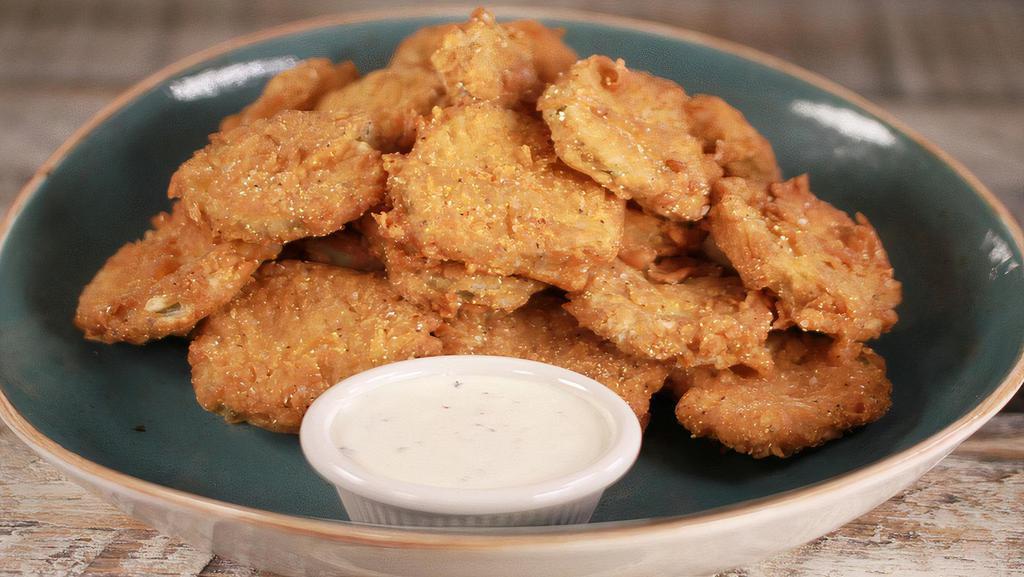 Fried Pickles · Hand-breaded dill pickle chips, served with our ranch dipping sauce