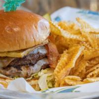Burger Caribbean · “A Taste of the Islands” topped with bacon, grilled pineapple, Havarti cheese and house-made...