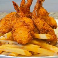 Crispy Coconut Shrimp · Jumbo shrimp crusted with coconut, fried and served with sweet pineapple dipping sauce and F...
