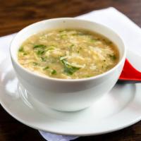 Chicken Manchow Soup · Spicy. Garlic flavor egg drop soup with tofu and mushroom.