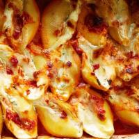 Stuffed Shells · Ricotta, mozzarella and marinara sauce.