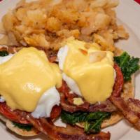 Setauket Eggs Benedict · Two poached eggs, spinach, tomato and bacon on an English muffin.