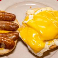 Two Eggs (Any Style On A Roll) · Two eggs any style with melted American cheese and split and grilled sausage links.