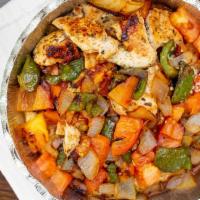 Chicken Souvlaki · With sauteed onions, peppers, and tomatoes.