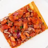 Focaccia Pizza Slice · With basil, tomato, onions, and fresh garlic.