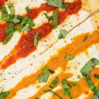 Margharita Pizza · Fresh mozzarella, tomato sauce, basil, and olive oil.