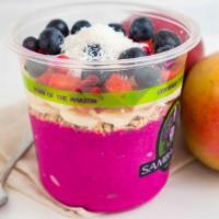 Pitaya Bowl · Blended pure dragon fruit banana mango topped with granola, fresh banana’s, blueberries, str...