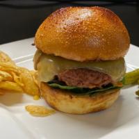 Beyond Burger · Beyond Burger (*Beyond Meat) on a Soft Pretzel Burger Buns with spinach tomato and red onion...